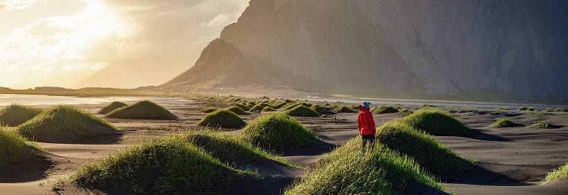 Campervan on Iceland’s Ring Road at sunset, illustrating lower daily rates on longer rentals—see more of Iceland for less with Campervan Reykjavik.