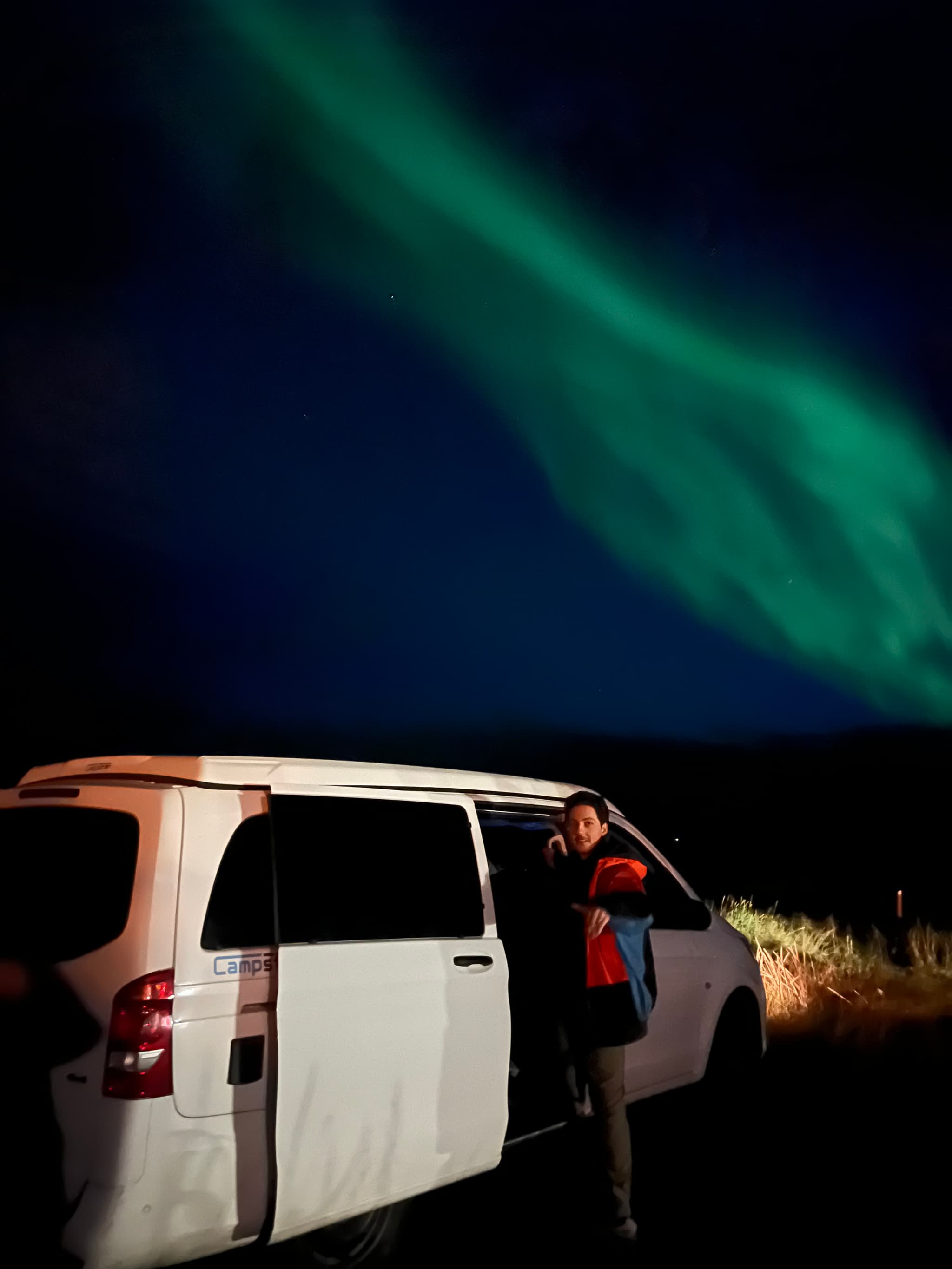Watching northern lights from campervan window